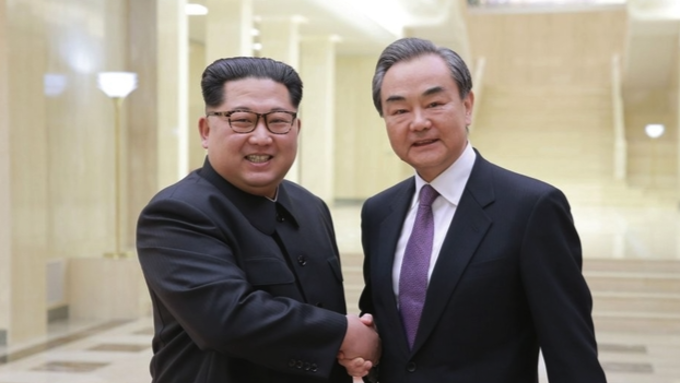 김정은, 6년 7개월 만에 방북한 왕이 접견…"북중관계 가장 귀중"